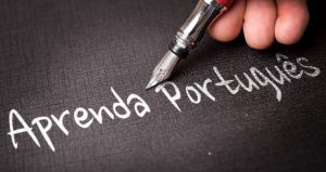 Hand writing in pen "Aprenda Portugues"