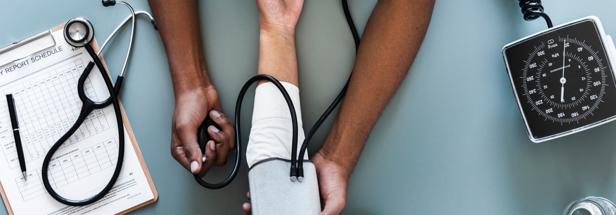 Nurse taking blood pressure