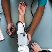 Nurse taking blood pressure