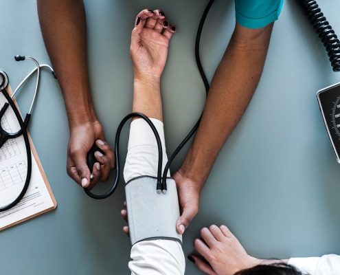 Nurse taking blood pressure