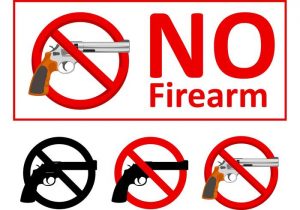 "No firearm" sign, 4 guns crossed out on a white background