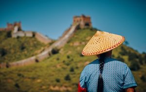 It would be a good idea to show some cultural appreciation after moving to a foreign country - if in China, you should visit the Great Wall, for example.