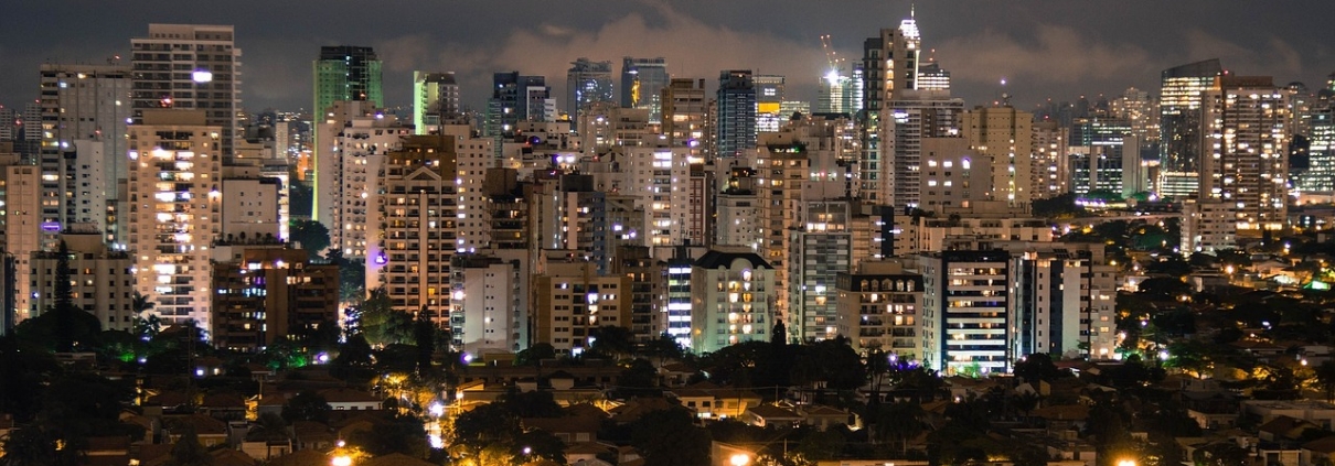 Sao Paulo at night - lots of high-rise buildings and a cloudy night sky